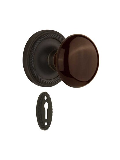 Rope Rosette Mortise-Lock Set with Brown Porcelain Knobs in Oil-Rubbed Bronze.